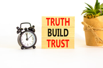 Truth builds trust symbol. Concept words Truth builds trust on wooden blocks on beautiful white...