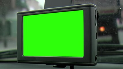 GPS with Green Screen in Car, GPS Navigation with Green Screen Inside Car. Close Up. You can replace green screen with the footage or picture you want with “Keying” effect in Adobe After Effects.