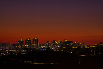Obraz premium Scenic view of cityscape against sky during sunset