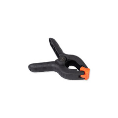 Plastic black and orange spring clamp isolated over white background