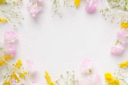 春の花とリボンのフラワーフレーム