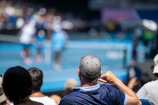 female Professional athlete Tennis player playing on a court in a tennis tournament in summer in australia