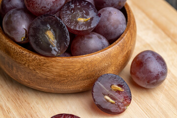 Harvested blue grapes on the table