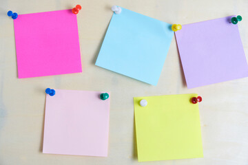 Colorful stickers for written notes are fixed plywood board.