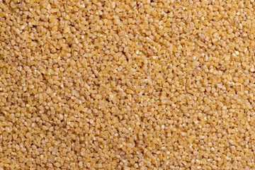 Fresh wheat porridge but cooked scattered on the table