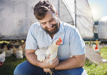 Man on farm, chicken and agriculture with happiness, poultry livestock with sustainability and organic free range. Agro business, farming and environment with animal, happy farmer in countryside