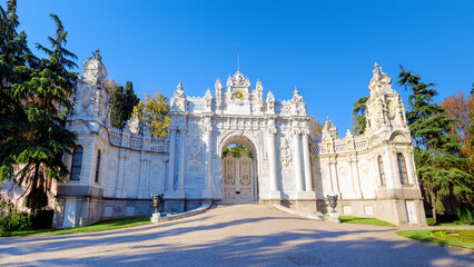 Fototapeta premium Dolmabahce Palace, Istanbul, Turkey. View of the palace from the side of the strait during sunset