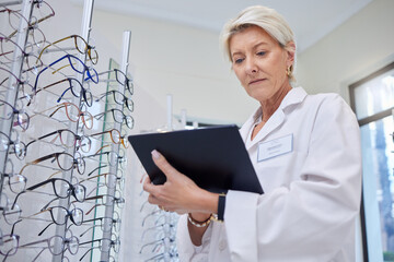 Glasses, optometrist and eye care with woman and tablet for retail, healthcare or consulting....