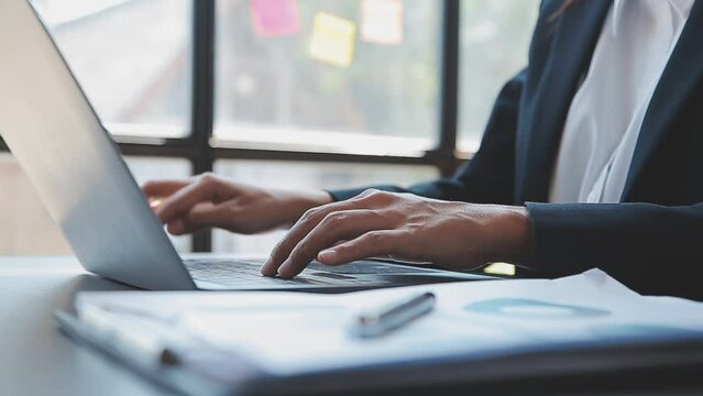 Entrepreneurs and business people conference in modern meeting room, happy multiracial coworkers have fun cooperating working together at office meeting, asian teamwork concept - Powered by Adobe