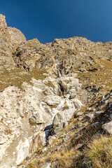 Waterfall in the Bezengi gorge of Kabardino-Balkaria. Nature of Russia Caucasus. Mountain landscape.