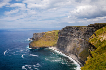 Spectacular Cliffs of Moher are sea cliffs located at the southwestern edge of the Burren region in County Clare, Ireland. Wild Atlantic way