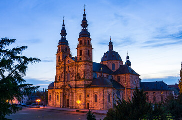 The landmark of the city of Fulda at nightfall, St. Salvator Cathedral, Fulda, Hesse, Germany,...