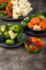 Different frozen vegetables. Food storage.