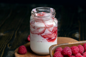 Fresh delicious milk yogurt with raspberry flavor