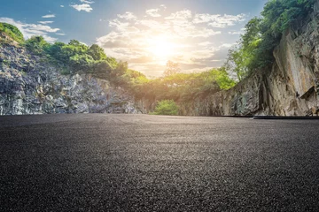 Foto op Canvas Asphalt road and mountain with sky clouds background at sunset © ABCDstock