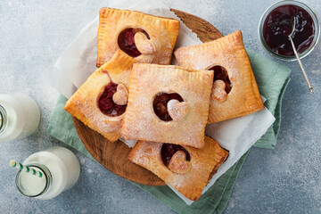 Valentines day heart shaped Hand pies. Mini puff pastry or hand pies stuffed with apple and...