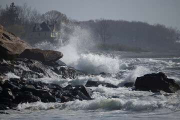 Ocean waves crashing on a rocky shore