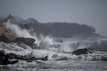 Ocean waves crashing on a rocky shore