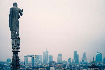 Naklejka premium view of misty Milan from its Dome