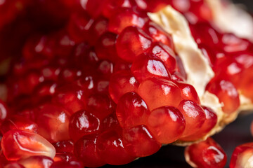 Delicious ripe red pomegranate with red and juicy grains