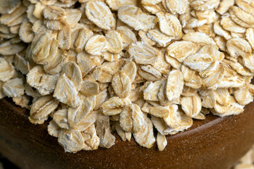 Oat flakes poured on the kitchen table