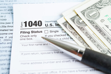 Obraz premium Tax form 1040 U.S. Individual Income Tax Return, business finance concept.