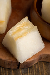 Ripe yellow melon cut into pieces and portions