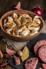 Peeled and cut mushrooms champignons during cooking