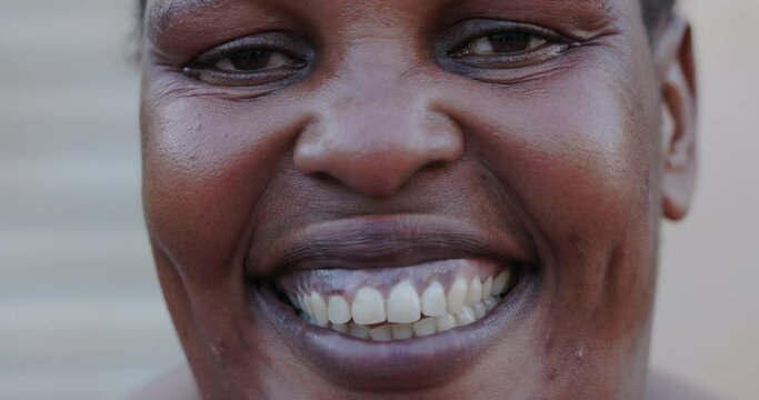 Close-up collage of smiling African people's faces