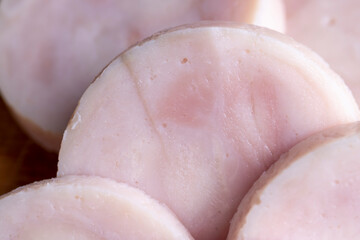 Sliced round-shaped ham from chicken meat