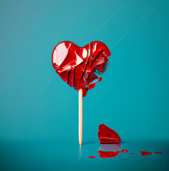 Red broken lollypop Heart Valentine's Day Illustration created by Generative AI technologyRed broken lollypop Heart Valentine's Day Illustration created by Generative AI technology