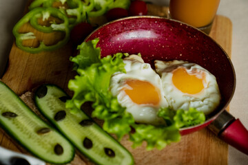 nice breakfast, scrambled eggs and a glass of fresh juice
