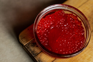 Pancake with red caviar for breakfast, a cup of tea