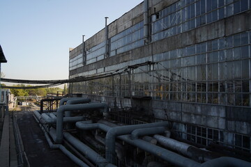 Almaty, Kazakhstan - 10.07.2022 : Large pipes on the territory of the heating plant and electrical substation.