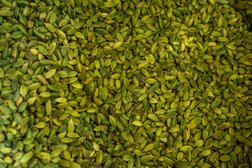 Macro close up of dried organic Cardamom or Elakka. Top view food background or texture. High quality photo