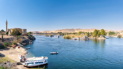 Fototapeta na wymiar Aswan, Egypt; February 7, 2023 - A view of the Nile at Aswan, Egypt