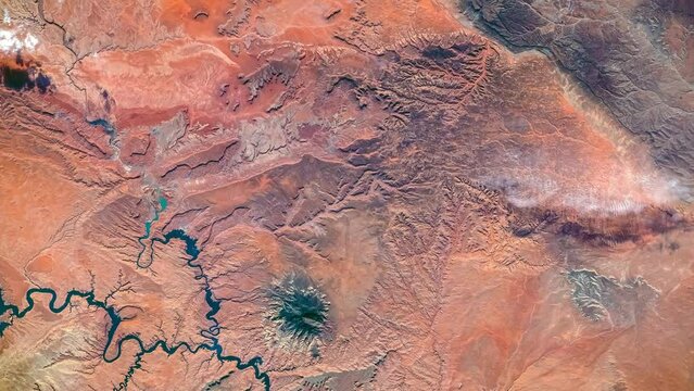 Aerial view of Lake Powell, Southeastern Utah and Northeastern Arizona, USA. San Juan River, Monument Valley, Navajo Mountain and Black Mesa seen from the top. Elements of this video furnished by NASA