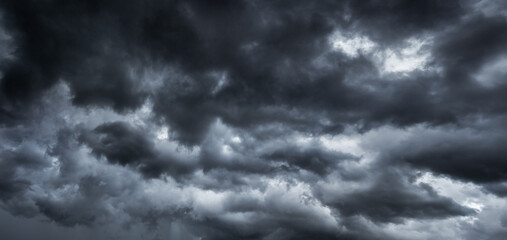 dark clouds make sky in black. Heavy rain thunderstorm. Pattern of clouds overcast predict tornado, Hurricane or thunderstorm and rainy. Dark sky cloudy have storm and lightning thunderbolt.