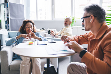 Multiracial businesspeople having fun in workplace