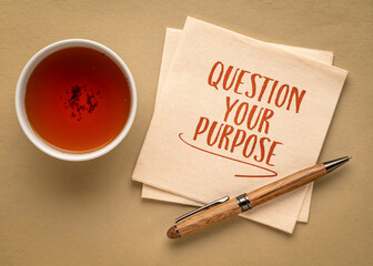 question your purpose - inspirational note on a napkin, personal development concept