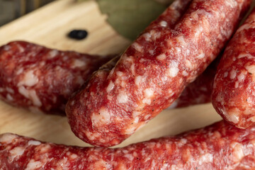 Dried veal sausage during slicing