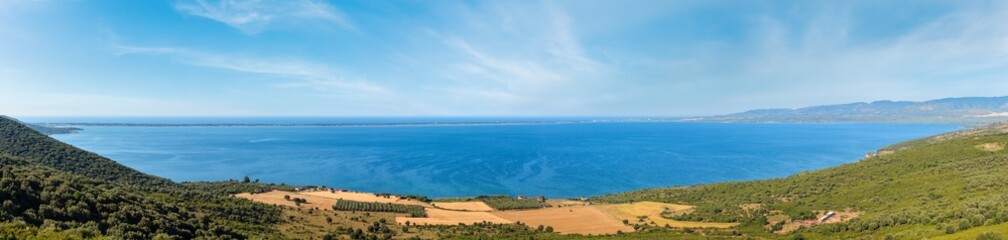 Summer panoramic view of Lago di Varano (Varano lake) on the Gargano peninsula in Puglia, Italy.