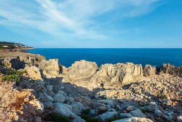 Fototapeta premium Rocky coast near Porto Miggiano Beach (Grotta delle Ancore) in Santa Cesarea Terme, Salento Adriatic sea coast, Puglia, Italy