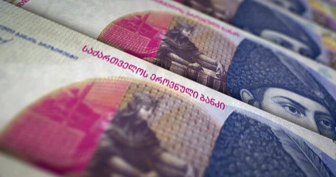 Georgia money Georgian Lari banknote loop. GEL money texture. Concept of economy, business, crisis, banking, recession, debt and finance. Moving over note. Loopable seamless 3d animation.