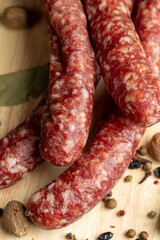 Dried veal sausage during slicing
