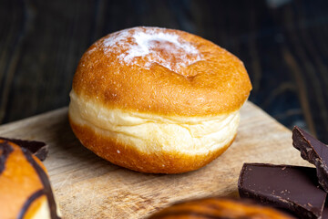 sweet donuts with milk cream filling inside