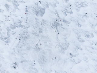 Fishermen on winter fishing. Air view.