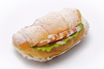 Stuffed croissant on a white background