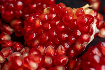 Delicious ripe red pomegranate with red and juicy grains