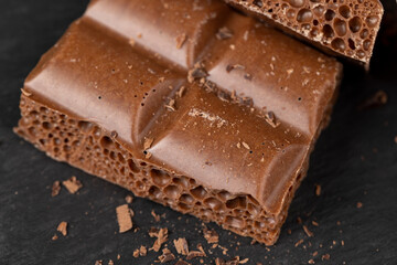 A piece of chocolate bar with air bubbles